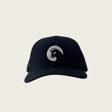 Bad Dog mesh-back trucker cap in black, front view, embroidered dog mark