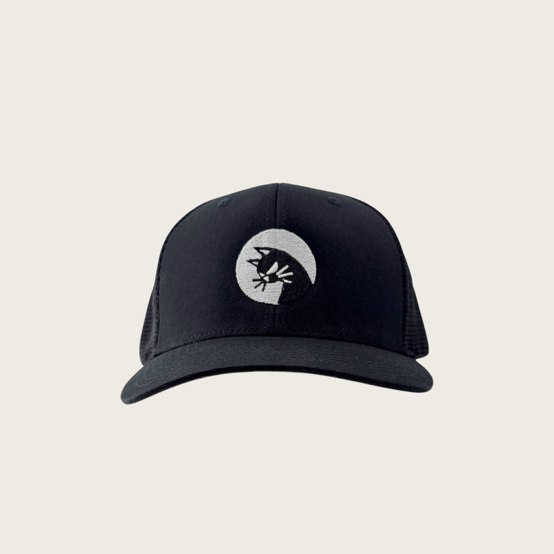 Bad Cat mesh-back trucker cap in black, front view, embroidered cat mark