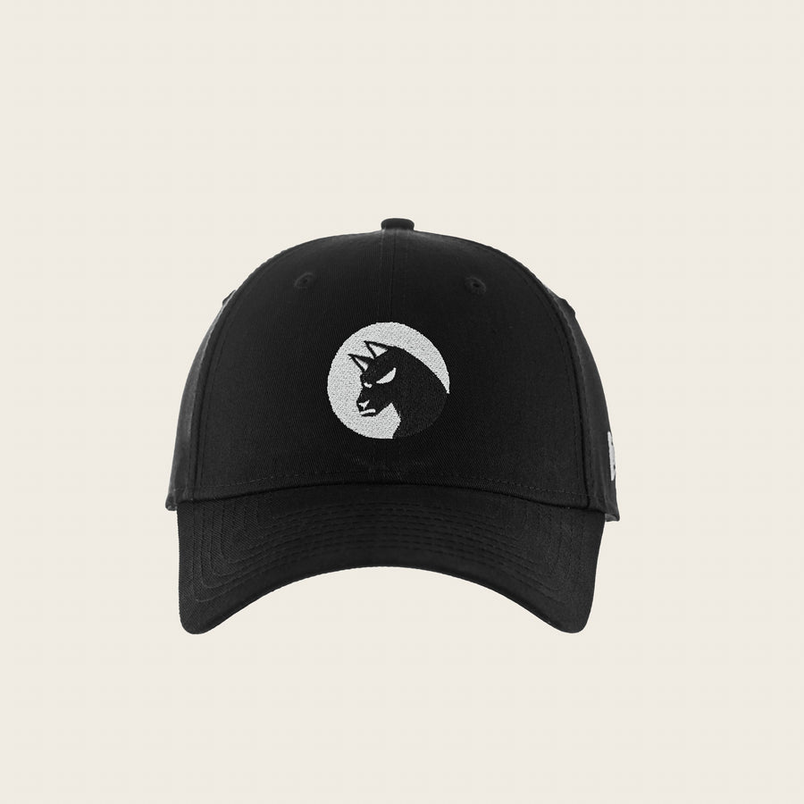 Bad Dog — black six-panel cap, front view with the snarling dog badge embroidered in white