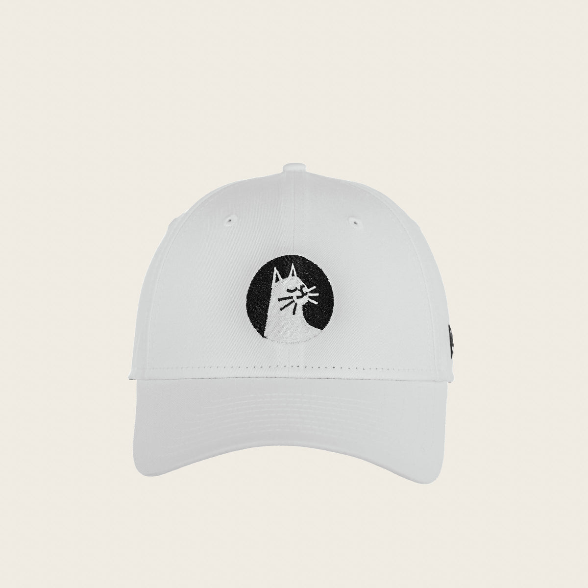 Good Cat — white six-panel cap, front view with the calm cat badge embroidered in black